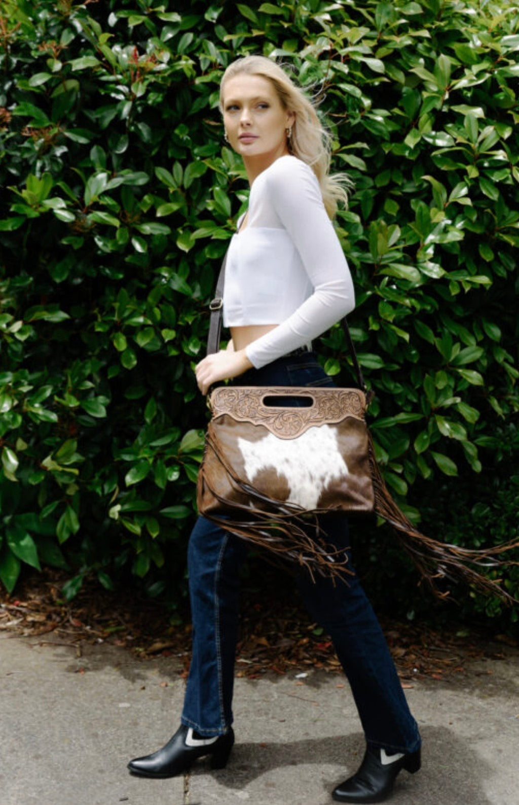 Tooling leather cowhide bag.