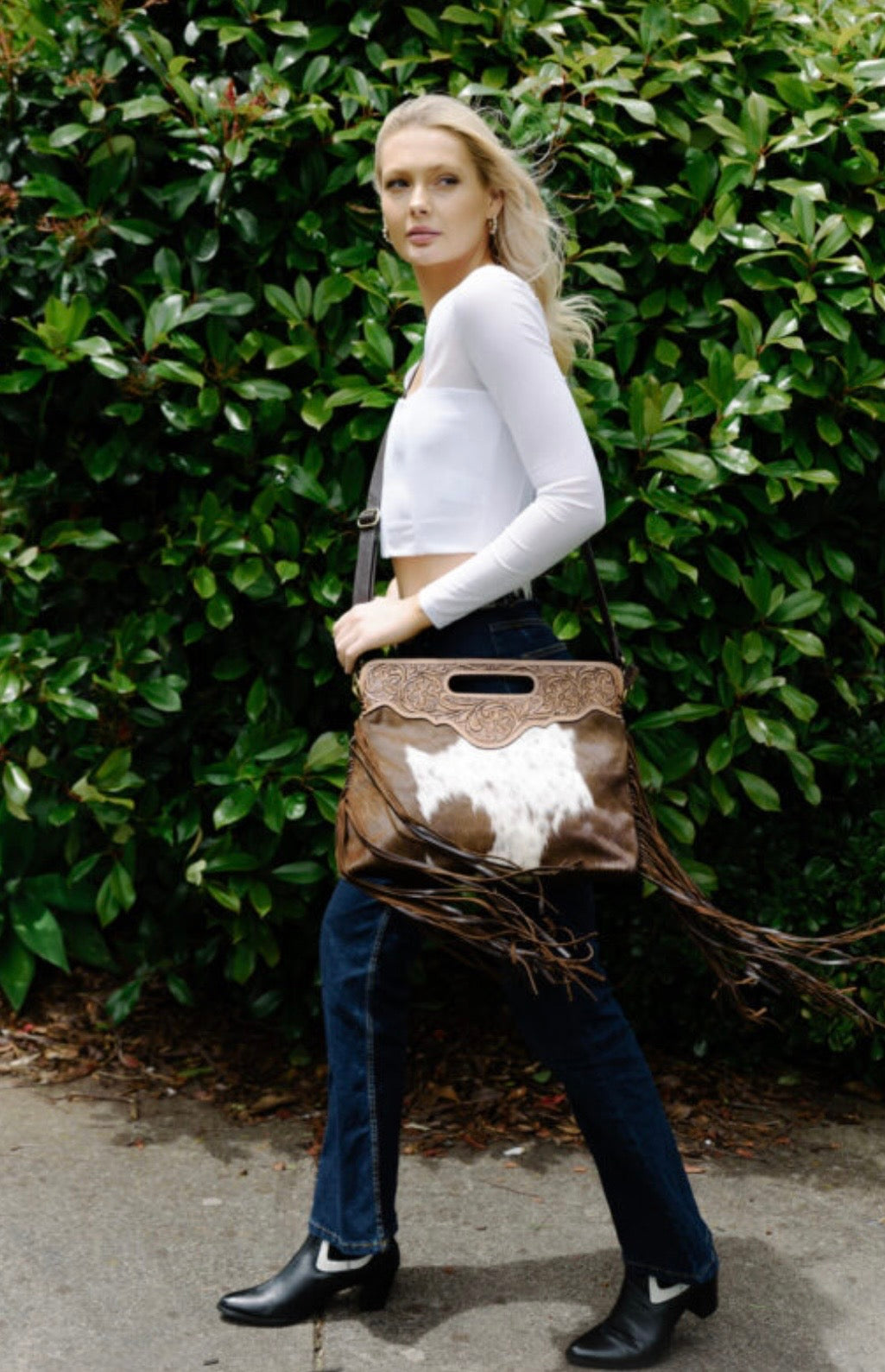 Tooling leather cowhide bag.