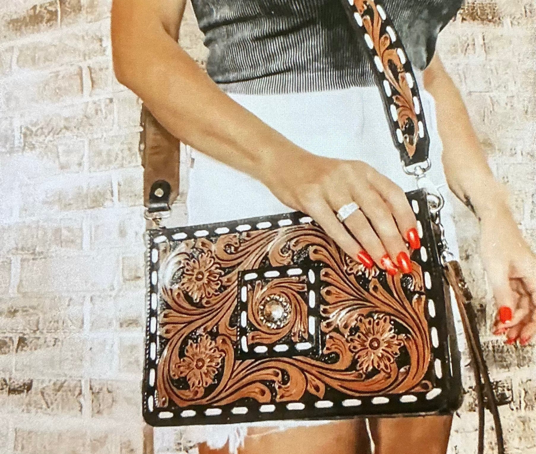 Tooled handbag