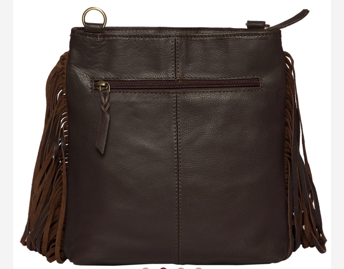 Hand painted cowhide with fringe.