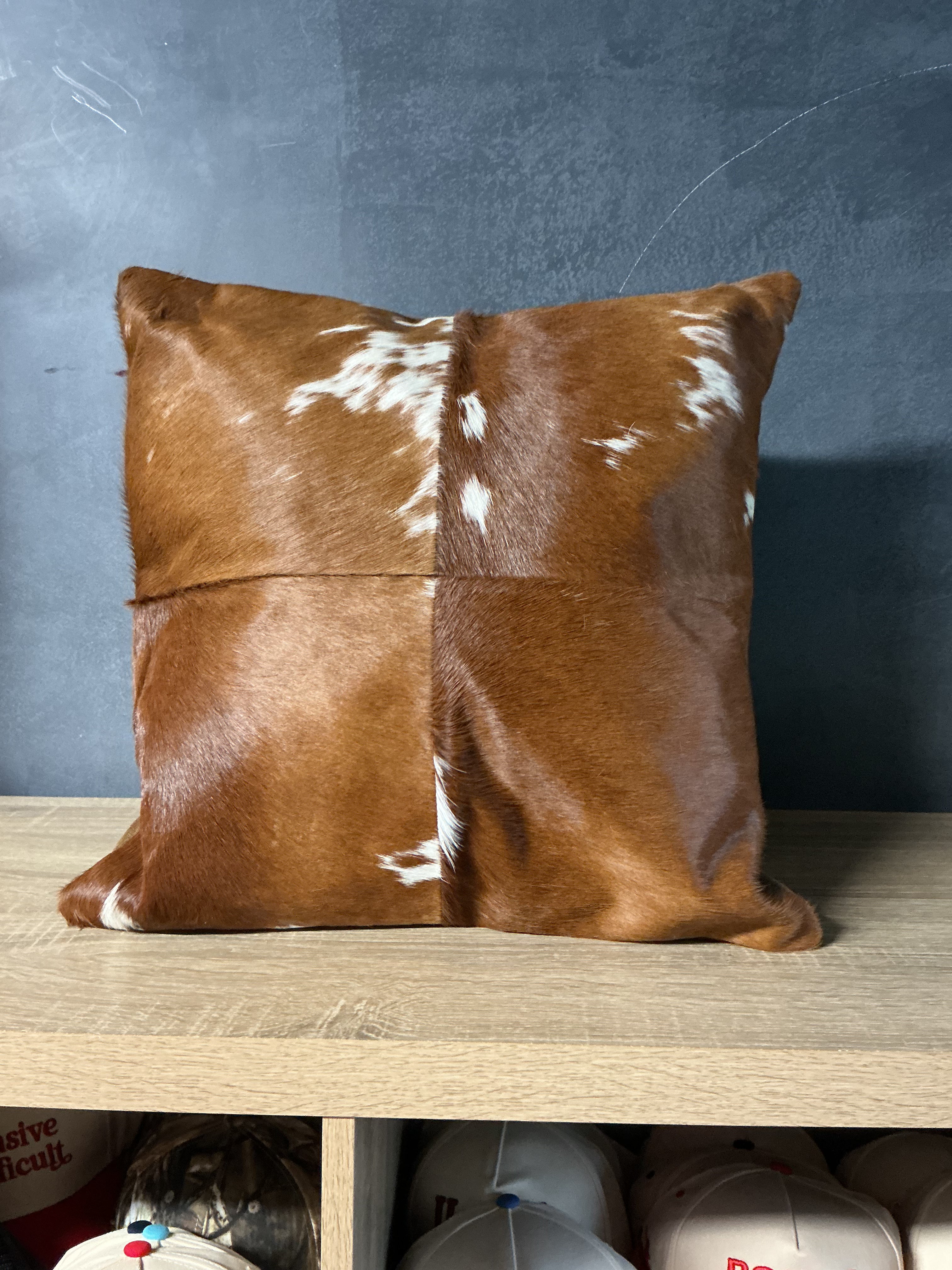 Tan/ white cowhide cushion